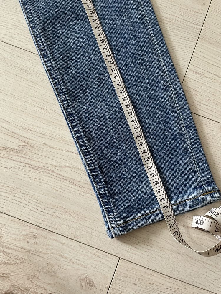 Niebieskie bawełniane meskie spodnie jeansy skinny Lee W30 L34