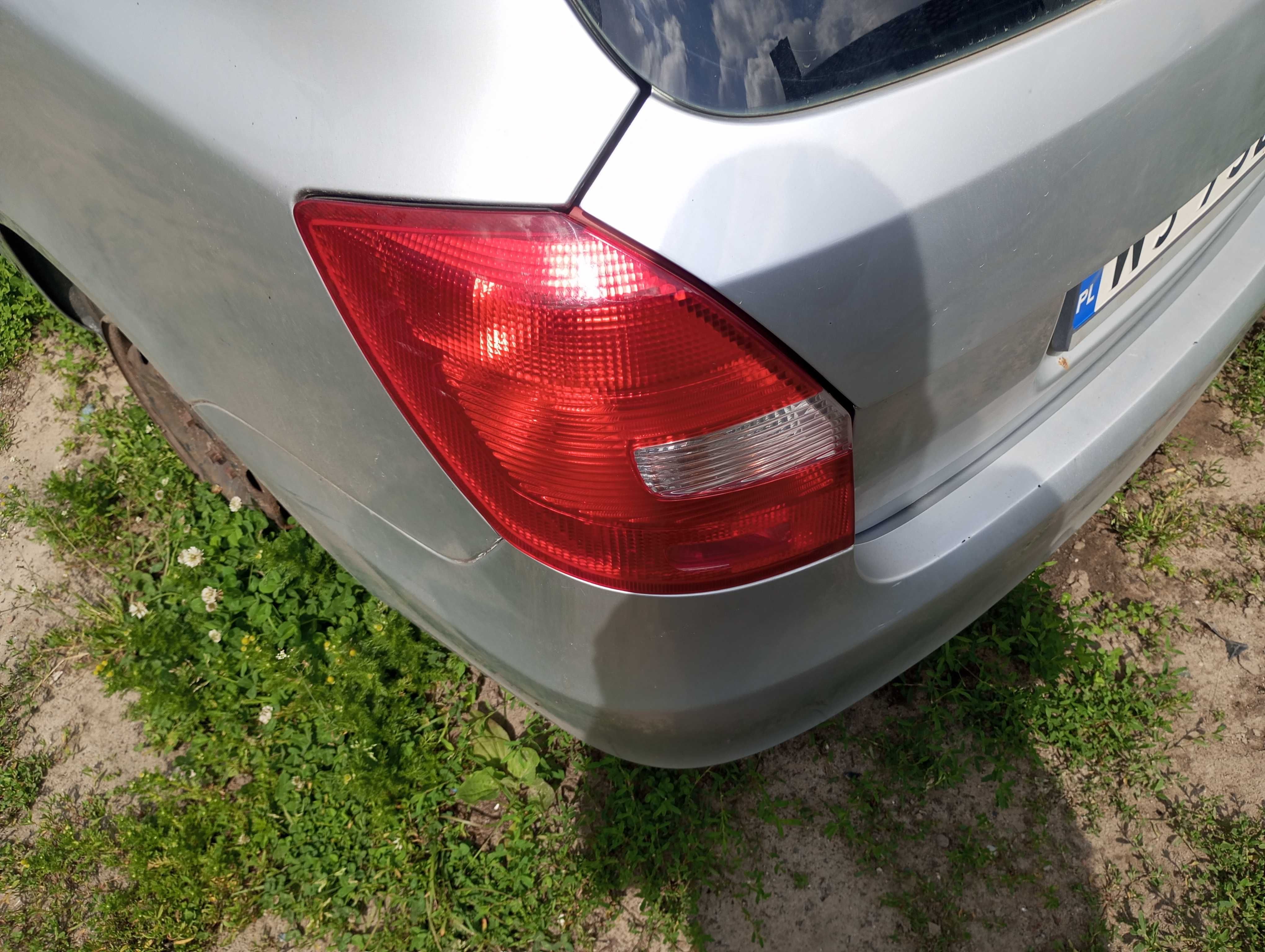 fabia 2 klapa tył lampa zderzak  lewa prawa  srebrna 9156