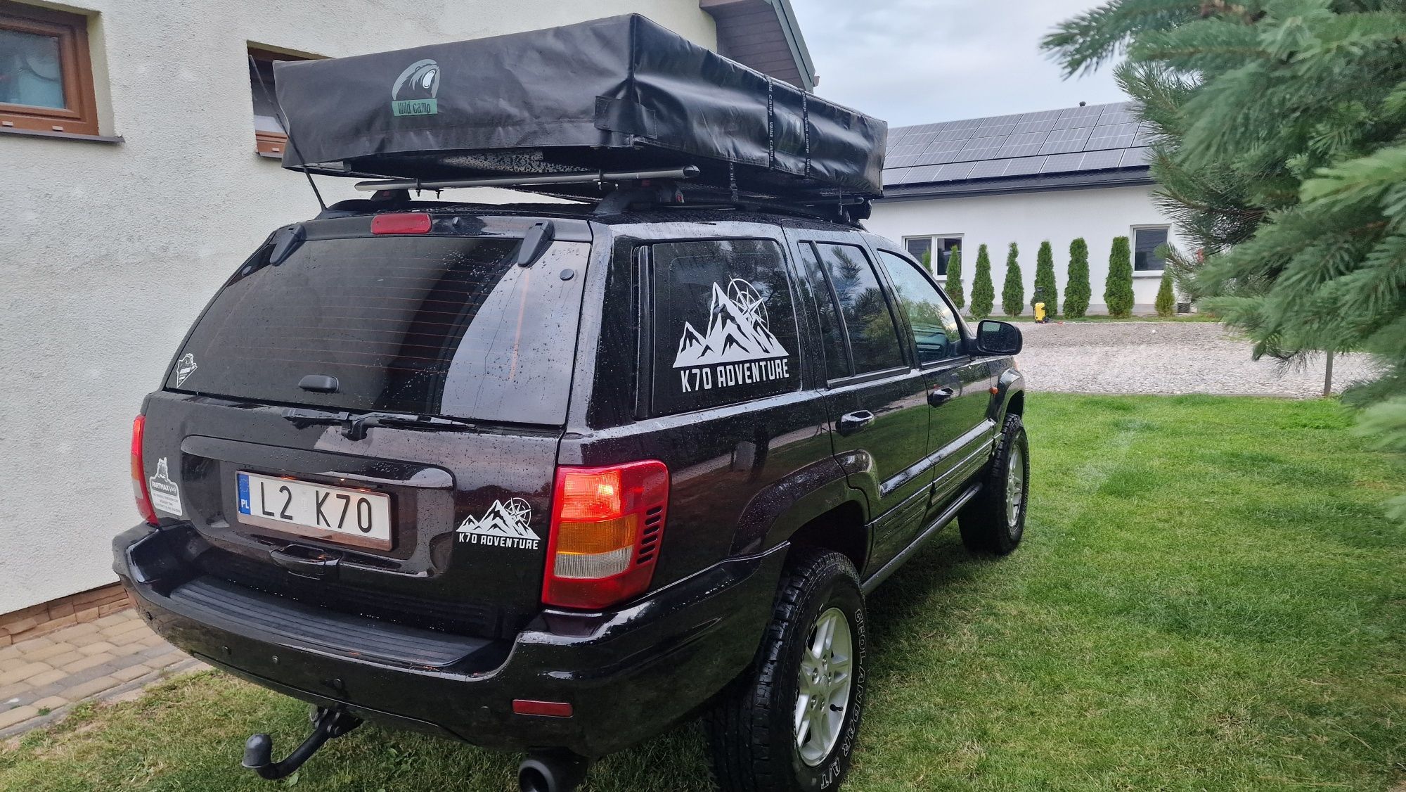 Wynajem samochodów terenowych jeep grand cherokee WJ z namiotem dachow