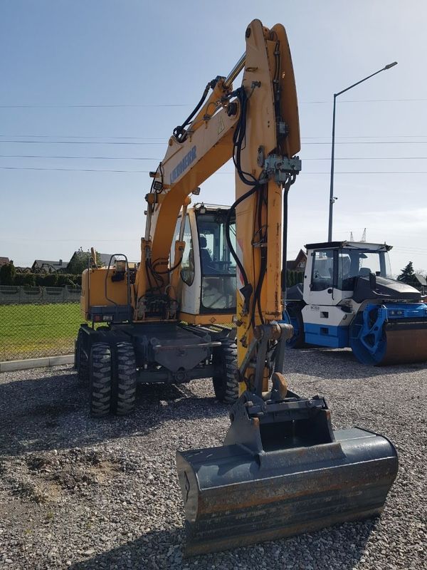 Liebherr 312 Litronic Koparka Kołowa  Klimatyzacja, Centralne