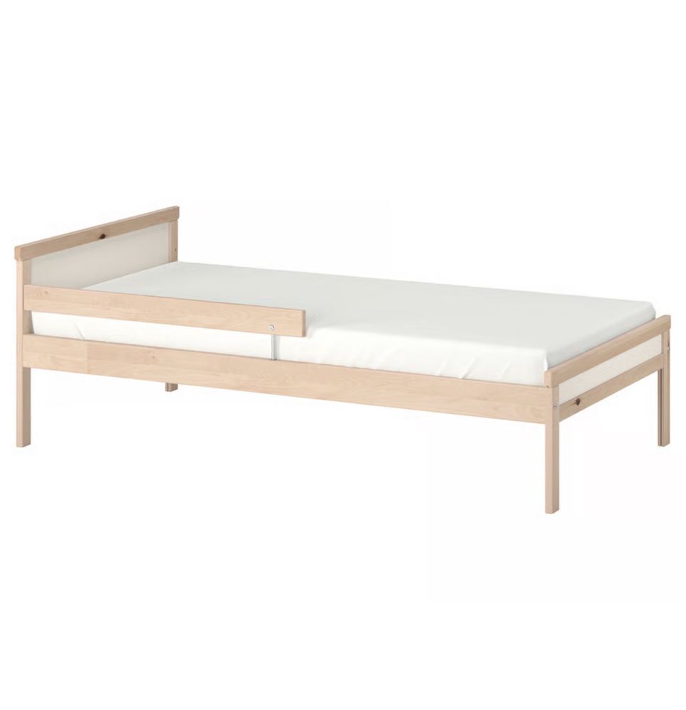 Mesa e camas de solteiro
