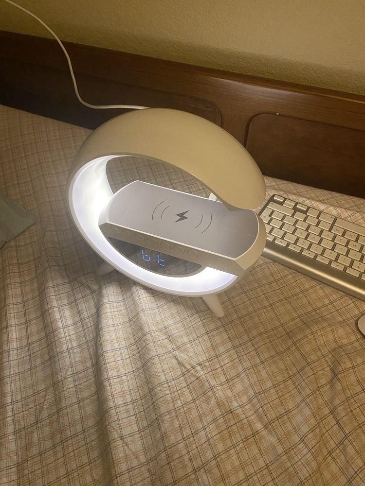 Led wireless charging speaker.