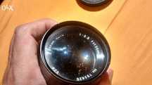 Lente de máquina fotográfica objetiva