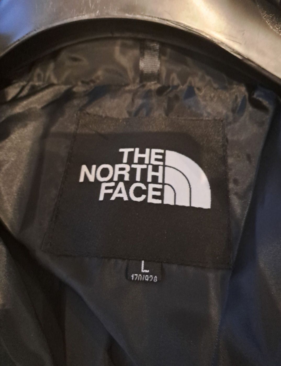 biala kurtka the north face