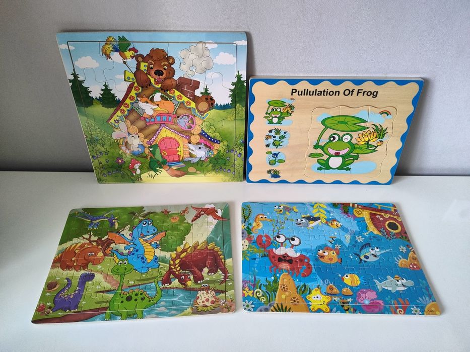 Дерев'яні іграшки пазли і вкладиші, вставки.