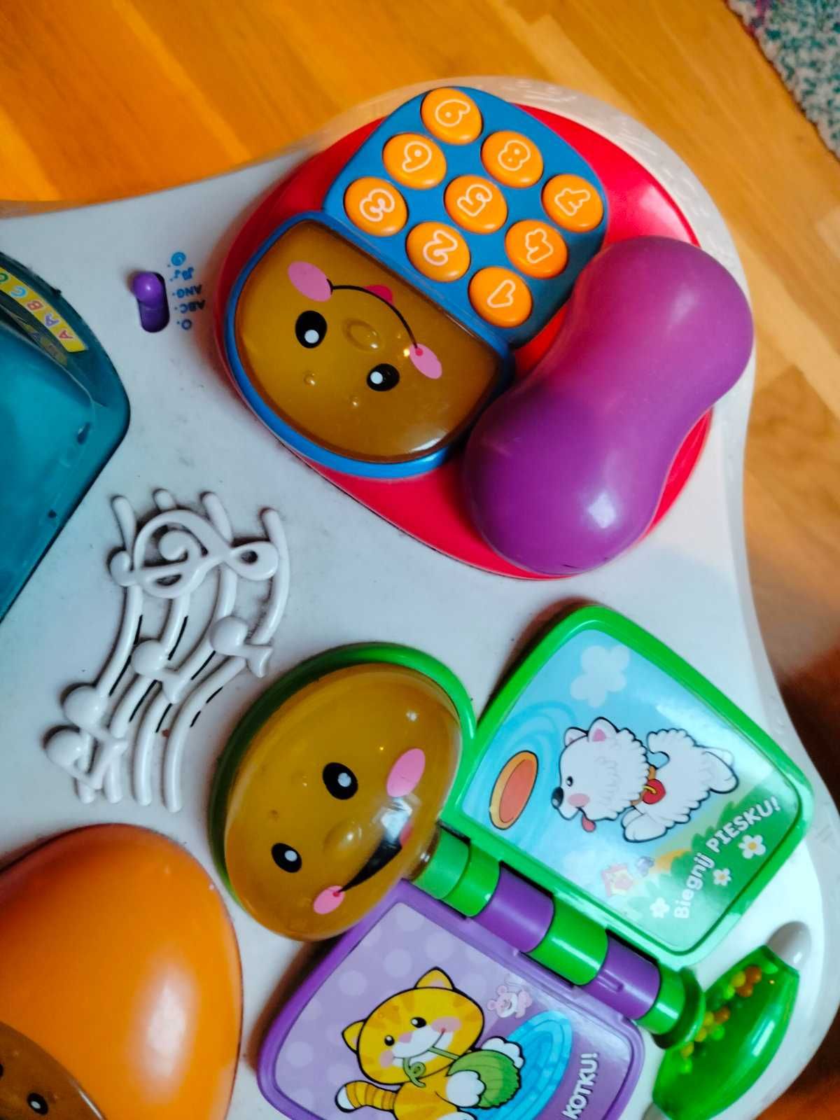 Stoliczek edukacyjny Fisher Price polsko-angielski słuchawka telefon