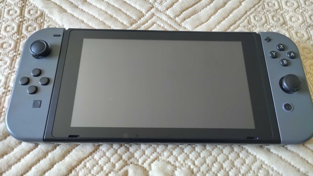 Nintendo Switch V1 + SD 200gb + Bolsa de viagem + Joystic extra
