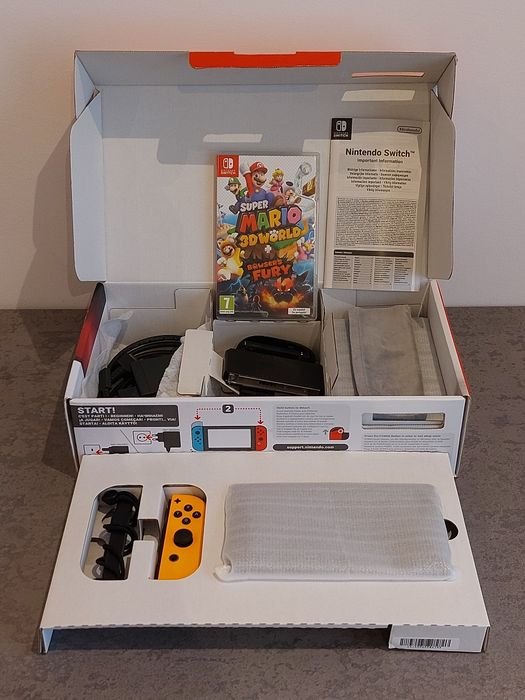 Nintendo Switch + Comando + Jogo + Bolsa + Cartão SD 64Gb