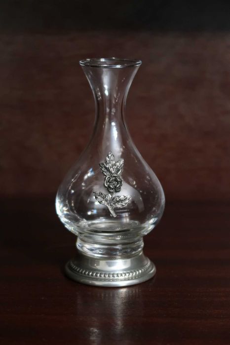 Frasco com aplicações em estanho