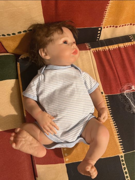Bebe reborn com roupa, chupeta e biberao