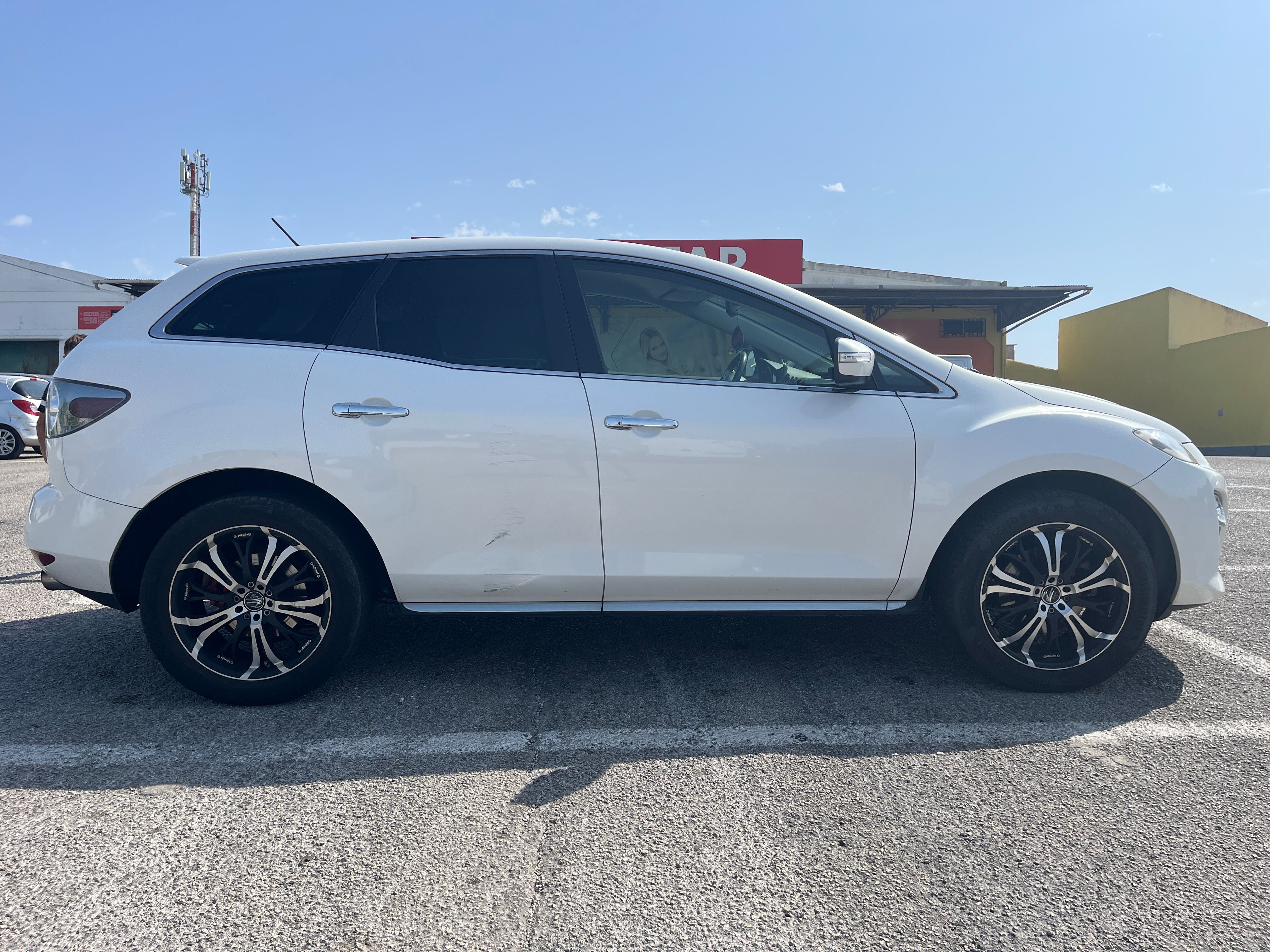 Mazda CX-7 2.3 Turbo 2012 | Bancos em pele e jantes Barracuda