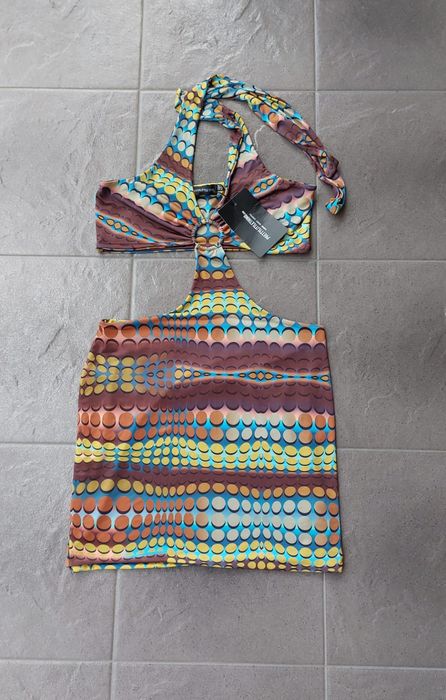 Sukienka mini wycięcia wiązana na szyi boho odkryte plecy L 40 Nowa