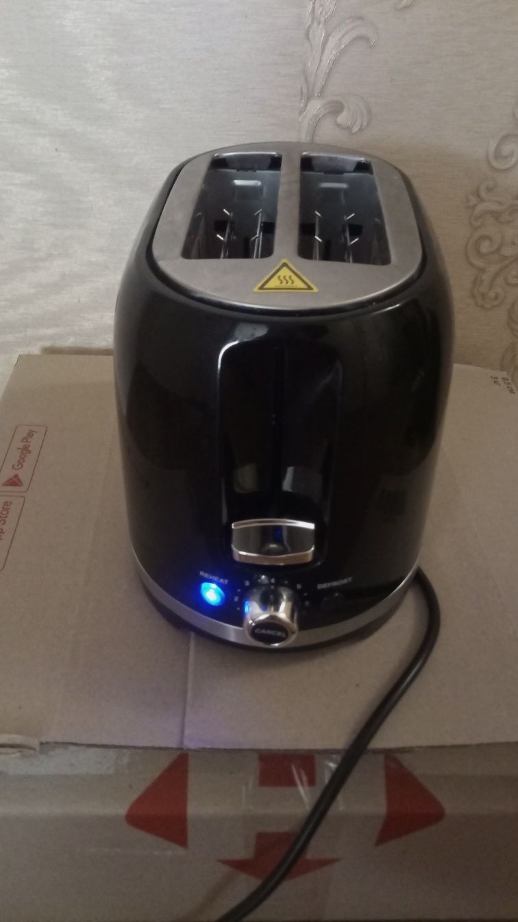 Тостер ROTEX RTM150-B