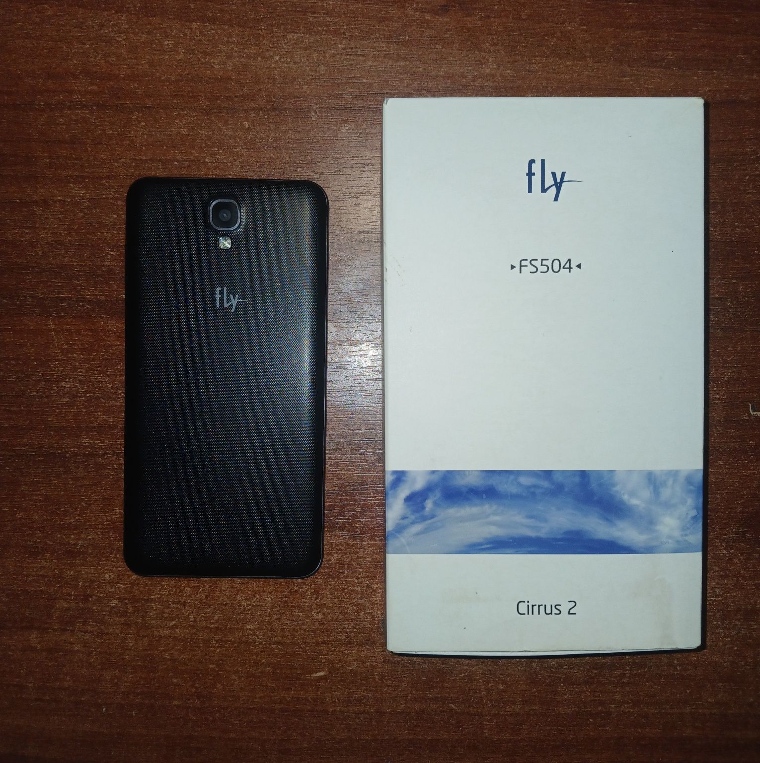 Телефон fly FS504