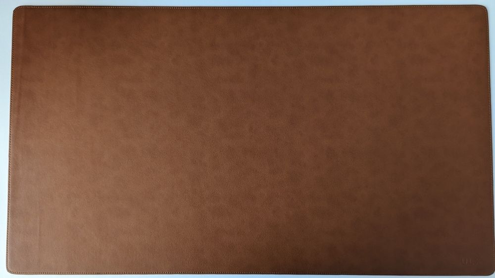 Tapete de secretária em pele