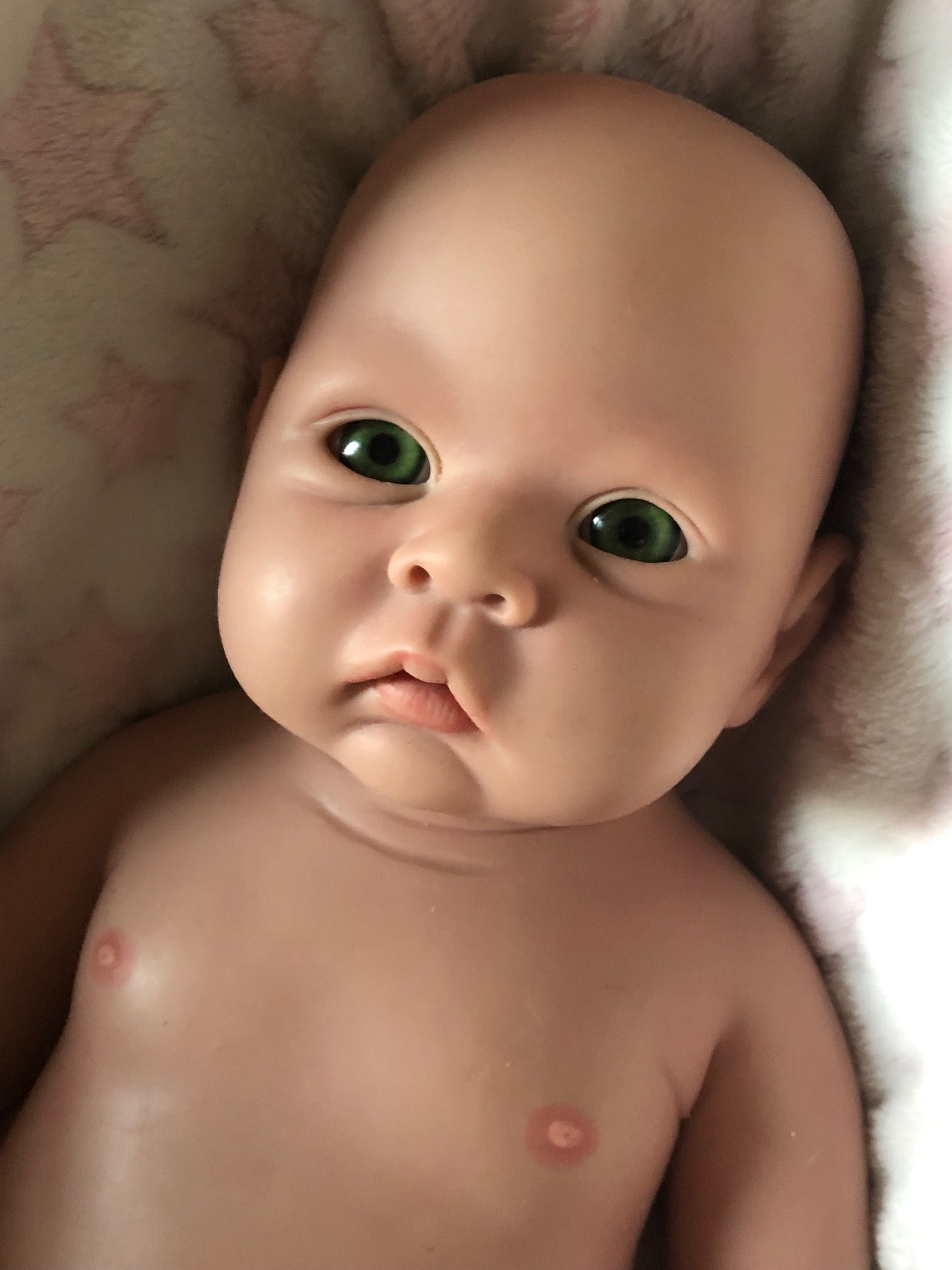 Boneca bebé reborn (verdadeiro silicone)