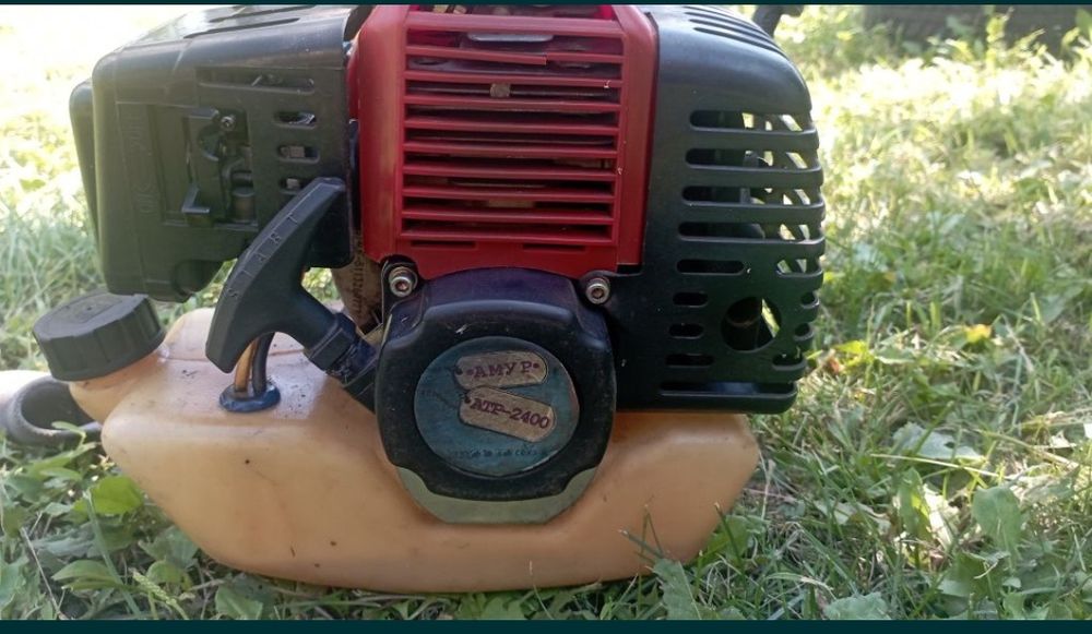 Бензокоса, бензотример