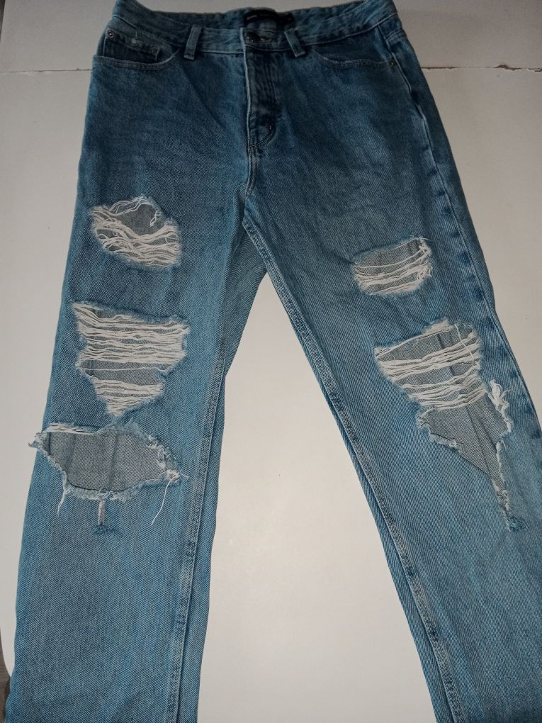 Spodnie jeansowe jeansy dziury M 38 Sinsay niebieskie