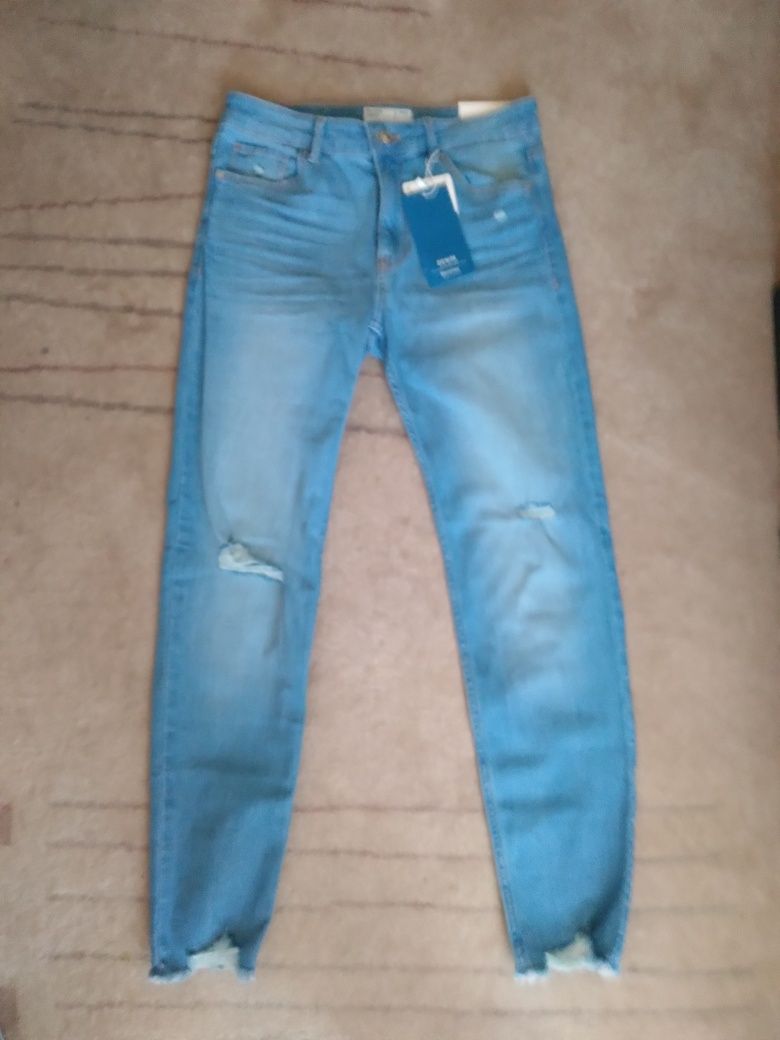 Spodnie jeansowe Bershka przecierane z dziurami r. 38