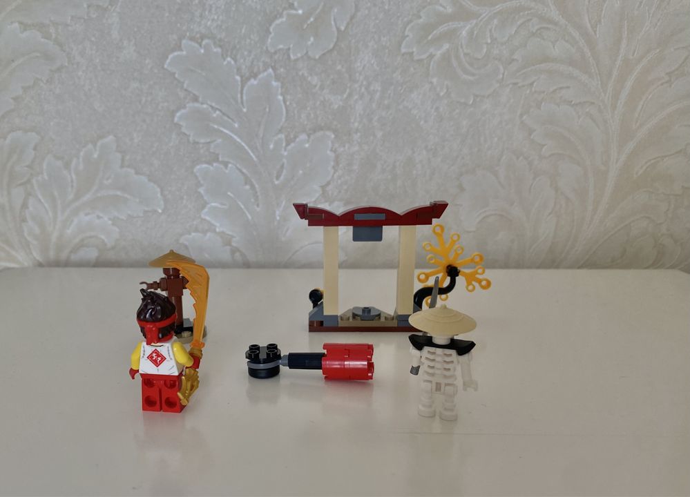 Конструктор LEGO NINJAGO Грандіозна битва: Кай проти Скалкіна (71730)