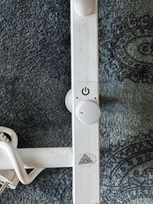 Електричний полотенцо сушитель