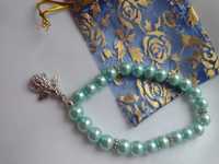 bransoletka 18cm błękitne perelki szklane i aniołek +woreczek