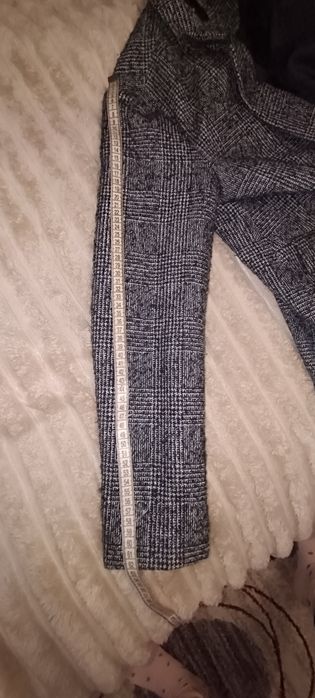 Жіноче пальто сірого кольору