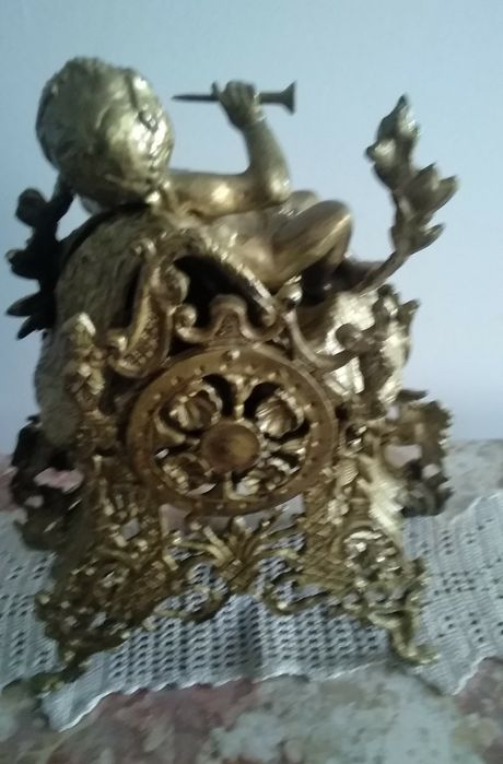 Relógio vintage em bronze,não funciona