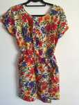 Vestido floral com bolsos