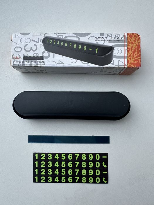 Тимчасова табличка з номером телефону для авто