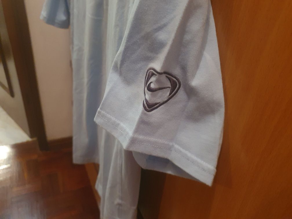 Polo de homem azul claro