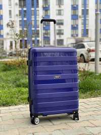 КАЧЕСТВО Средний чемодан пластиковый из полипропилена валіза середня