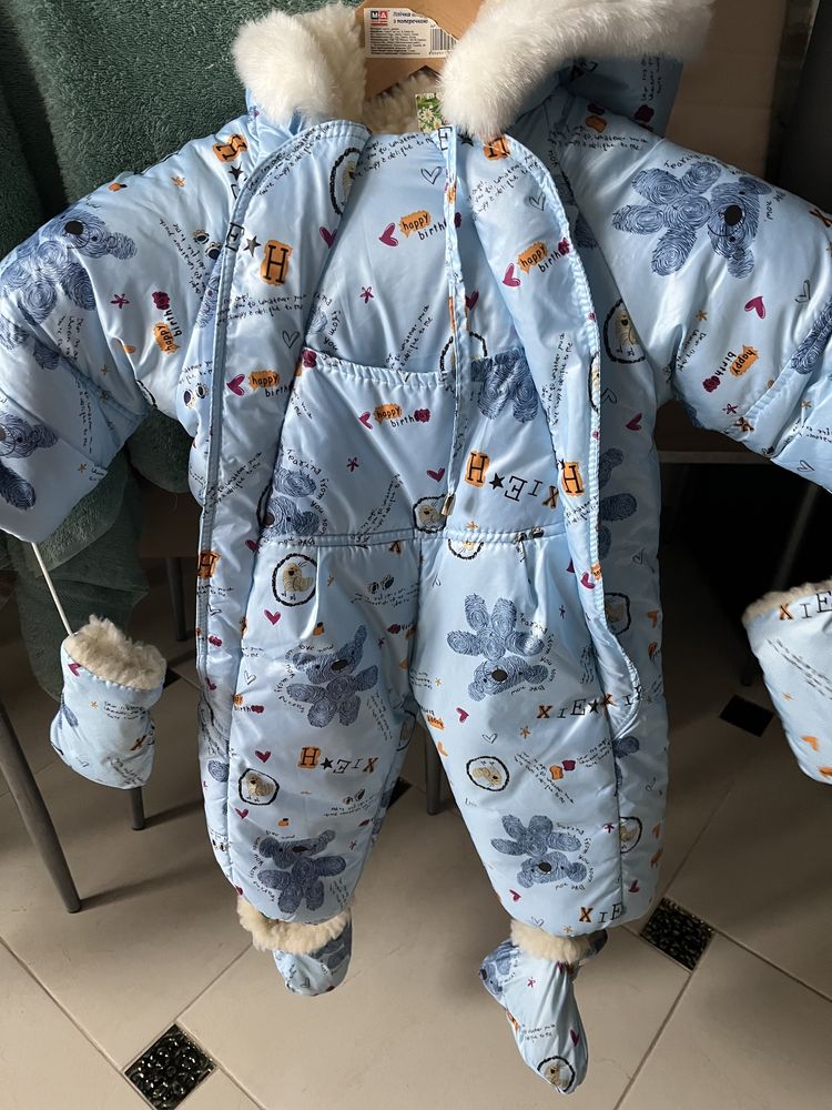 Продам новый зимний комбинезон