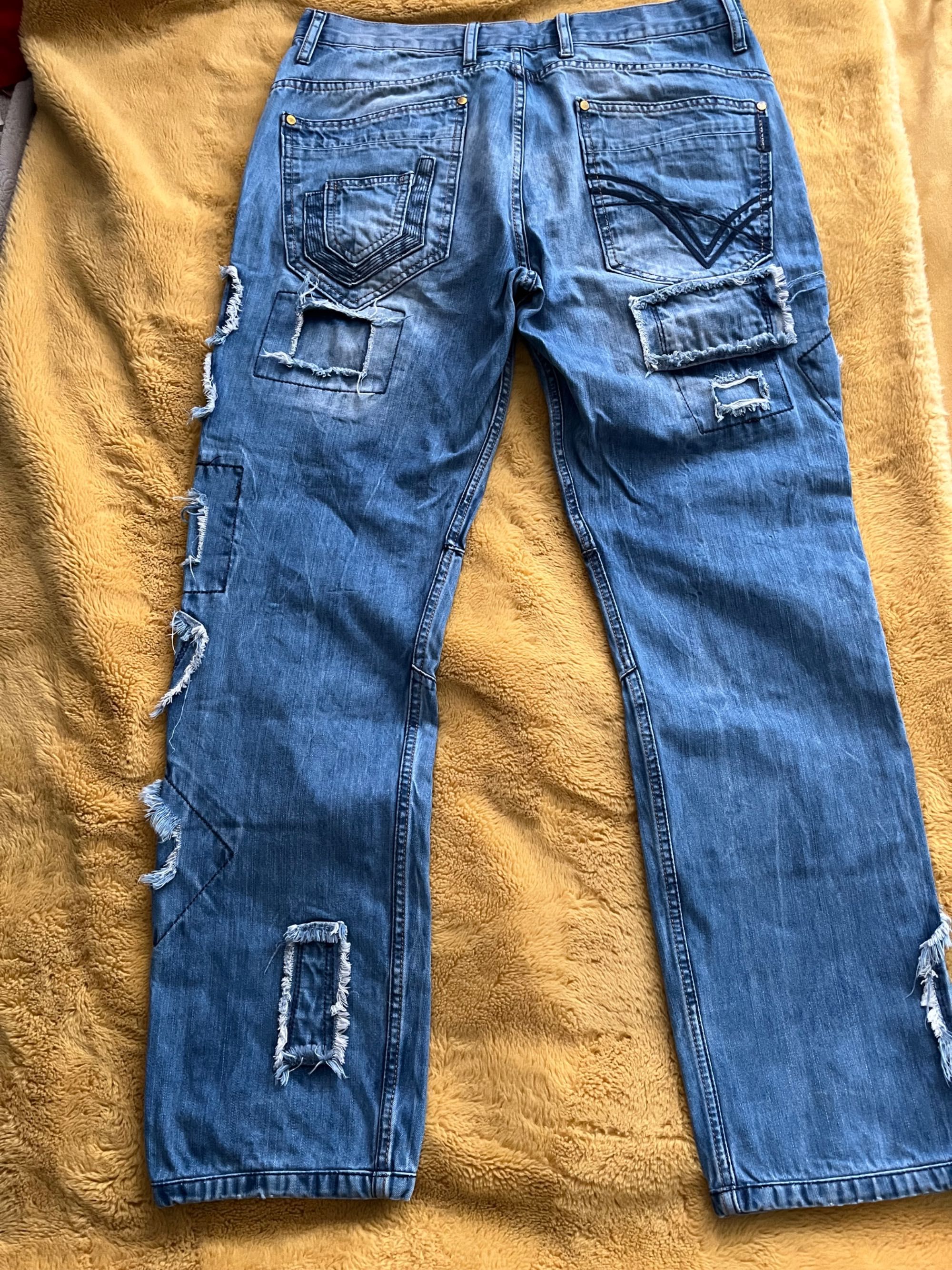 Spodnie męskie jeans Cipo&Baxx  łaty bawełna  W34L34