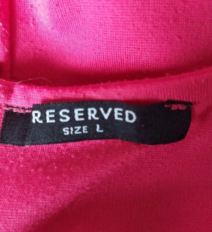 Dzianinoea sukienka bez rękawów. Reserved. Rozmiar M/L