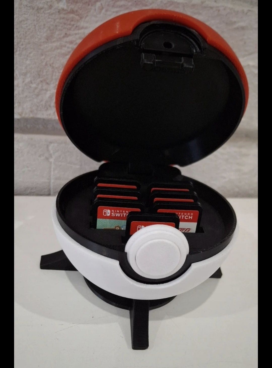 Pokeball pojemnik na gry Nintendo