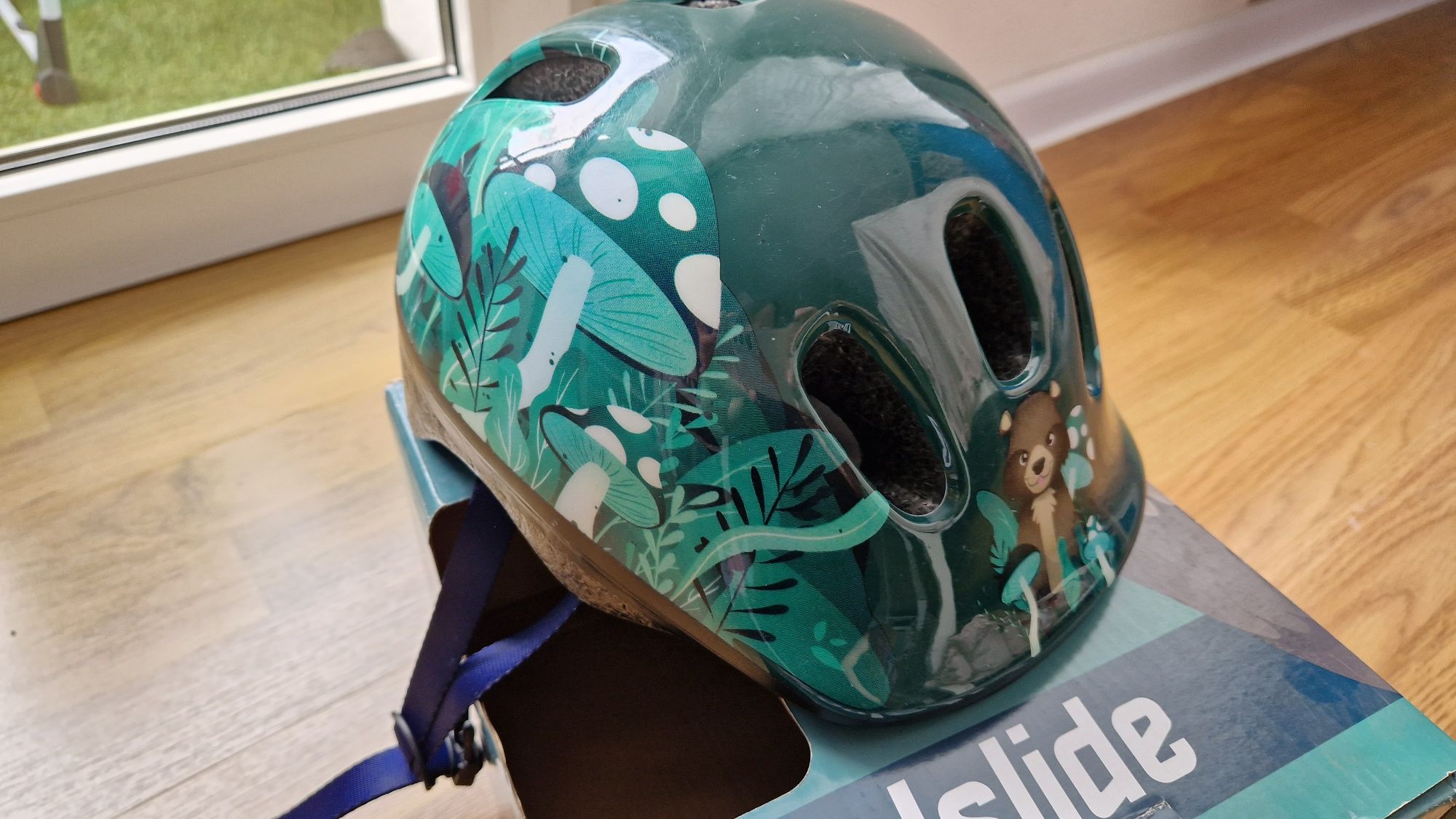 Zielony kask dla dziecka Coolslide jak nowy S 48-52