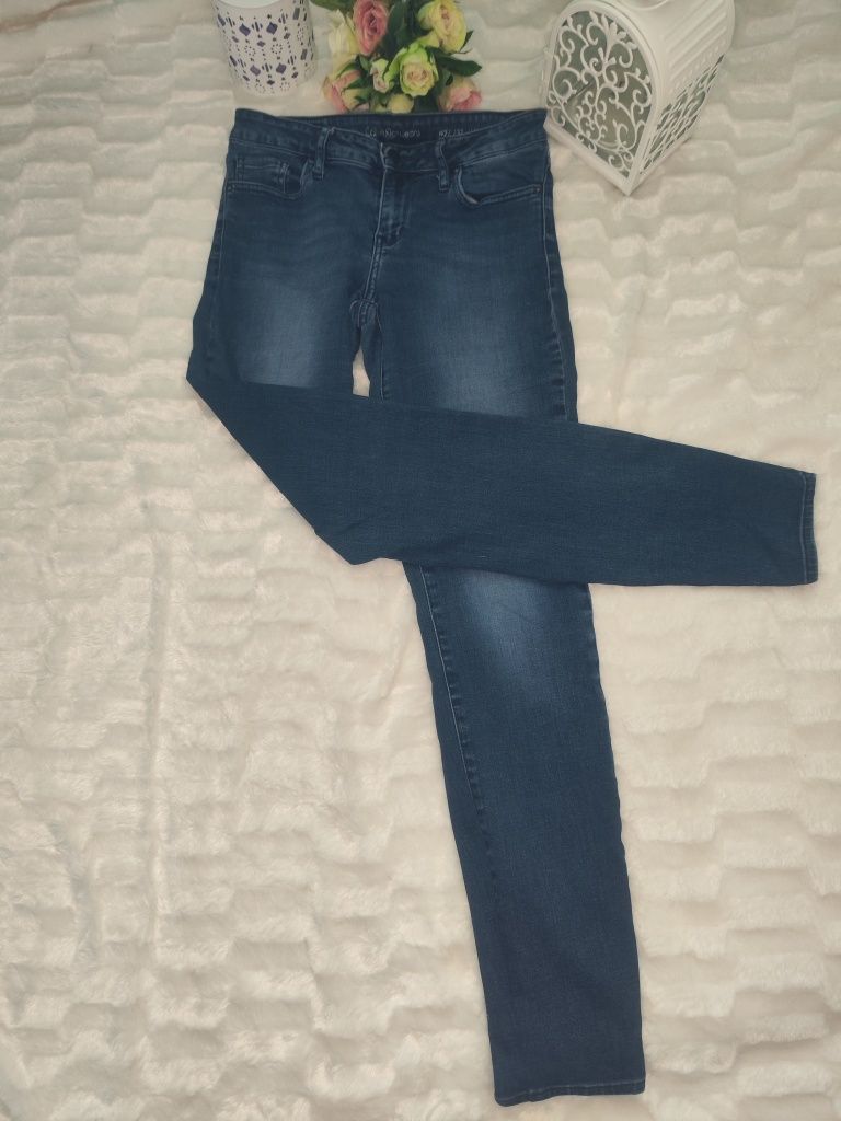 Jeansy Calvin Klein rozmiar z metki 27/33 W27L32
