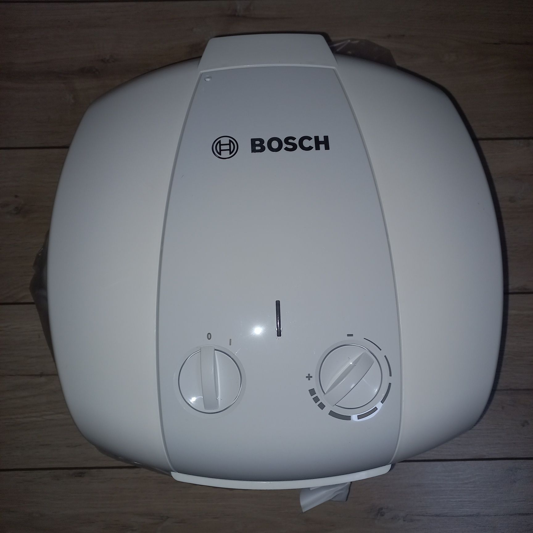 Водонагрівач Bosch TRONIC 2000 (над мийкою)