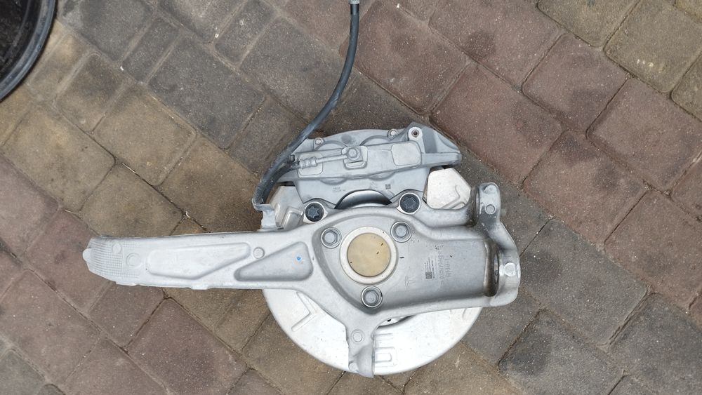 Супорт кулак ступіца передній лівий правий Tesla model 3 тесла