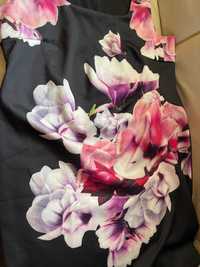 Duża ,czarna sukienka w kwiaty magnolii- nietrafiony prezent