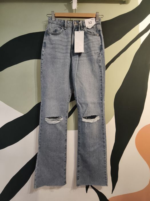 Sinsay jeansy flare z dziurami 32 nowe