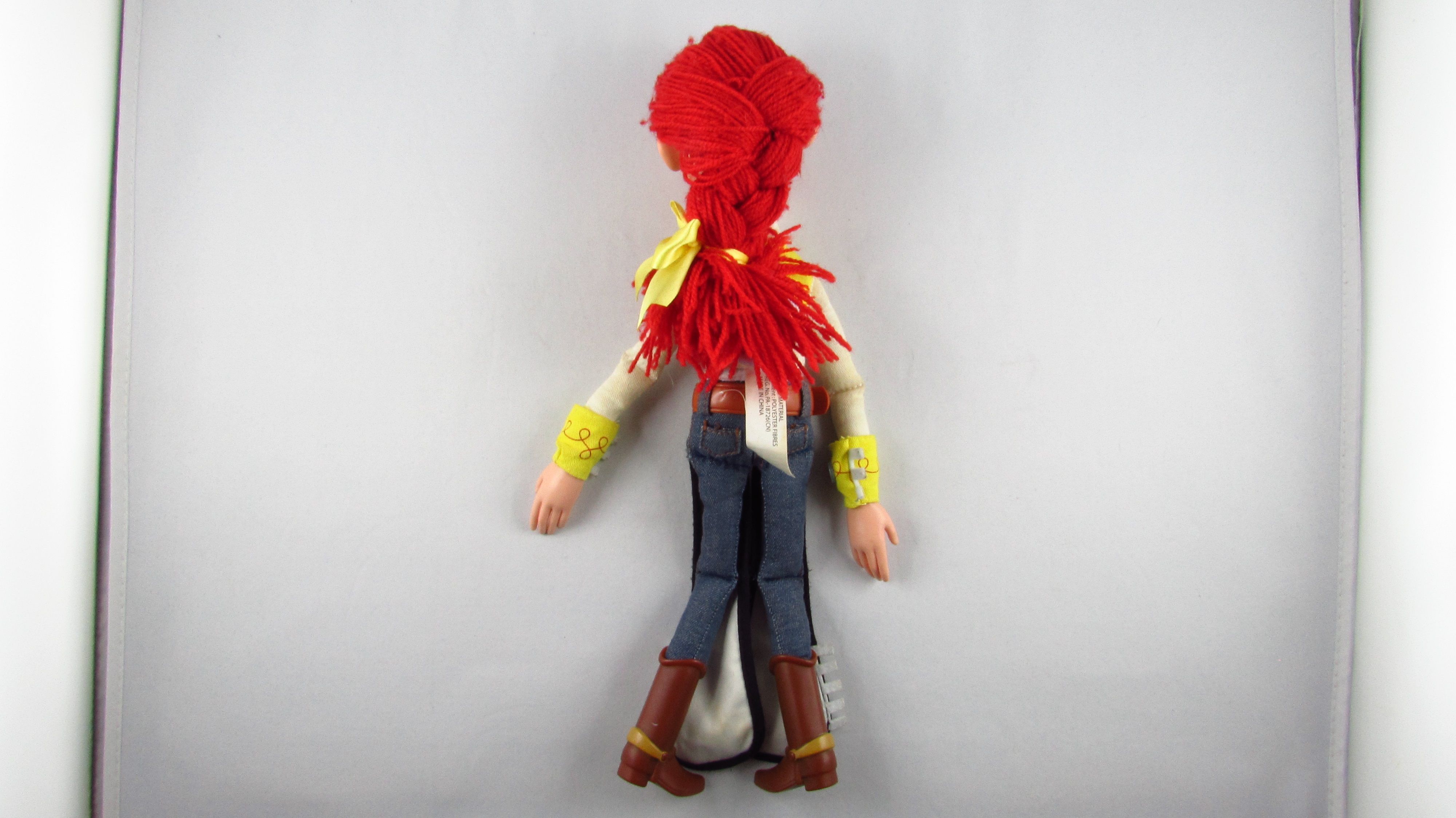 DISNEY PIXAR Toy Story Kowbojka Figurka Jessie Yodeling Cowgirl Mówiąc