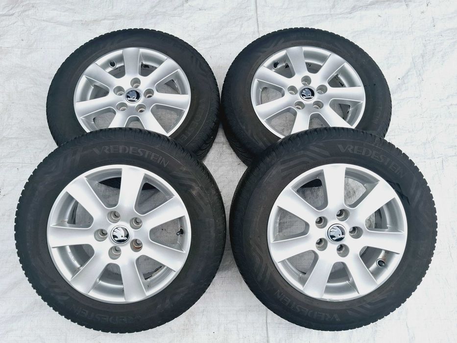 koła felgi aluminiowe z oponami całoroczne skoda octavia ii 195/65r15
