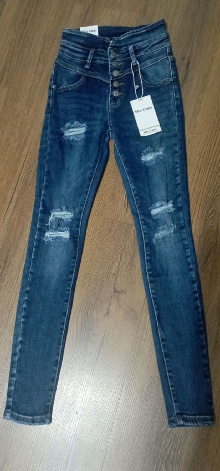 Nowe spodnie/jeansy r 36/S