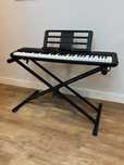 Piano Casio Casiotone CT-S300 com suporte