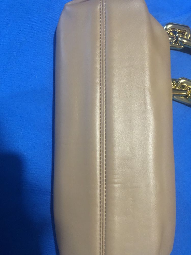 Carteira estilo bottega veneta