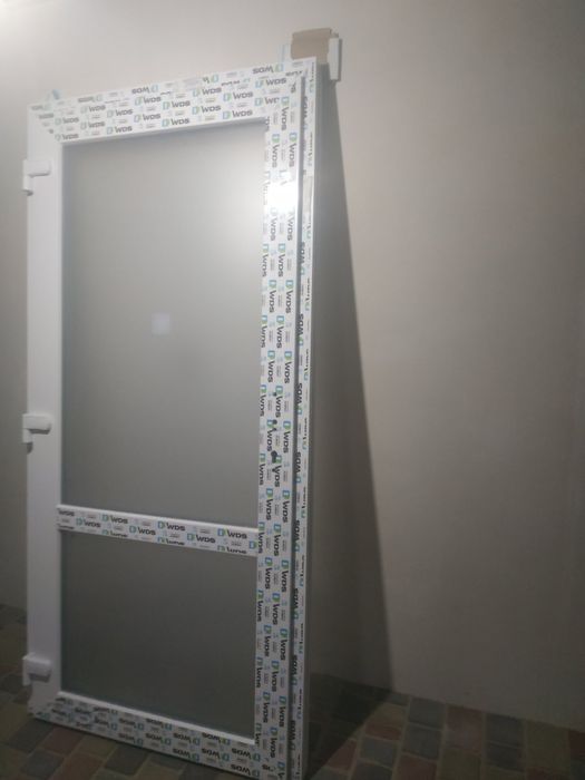 Металопластикові двері WDS