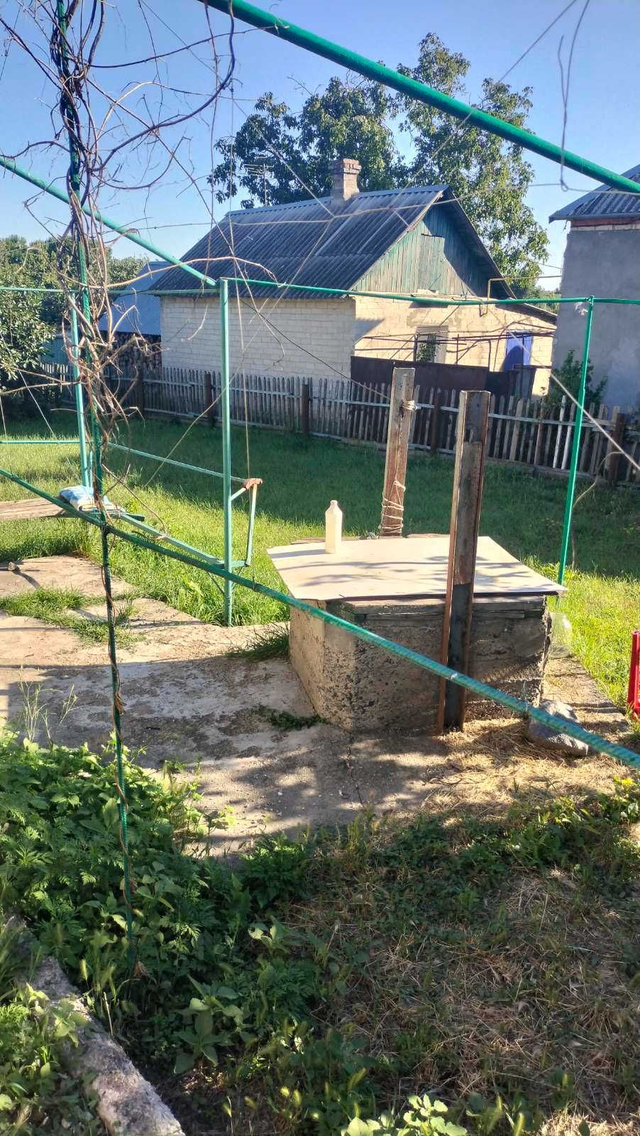 Терміново продам будинок з ділянкою та хоз.будівлями,колодязь,торг