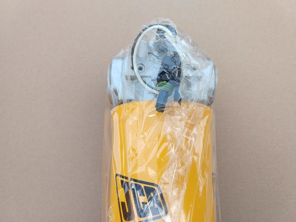 Filtr hydrauliczny z podstawą ładowarki JCB ze skrzynią automatyczną